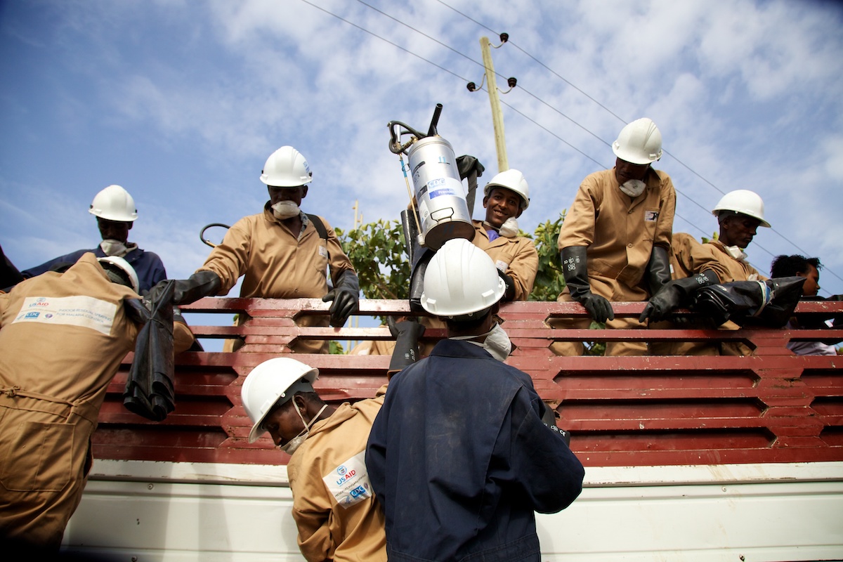 IRS spray team unload their truck during IRS campaign, Ethiopia 2014